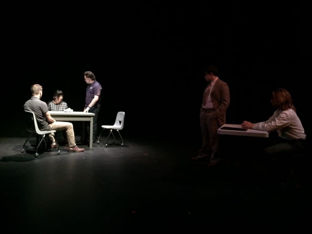 LEFT - Worcester Police Sergeant Kevin Pageau (portrayed by Ben Gold '13) and Detective John Doherty (portrayed by Ryan Mouton '17) interrogate Nga Truong (portrayed by Christine Kim '17) about the alleged murder of her son. RIGHT - Attorney Ed Ryan (portrayed by Dylan Hoffman '18 ) and WBUR journalist David Boeri (portrayed by Sumner Alperin-Lea '18) watch this flashback of the interrogation. (Courtesy Julian Seltzer)