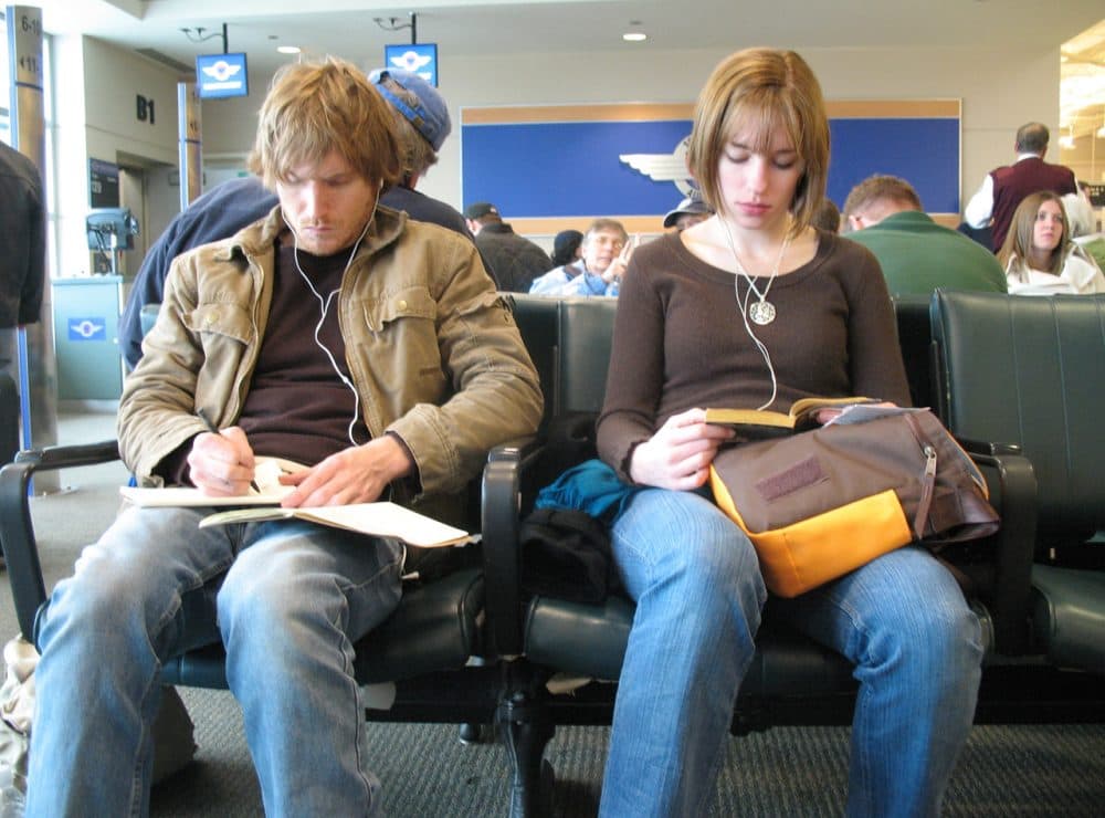 More companies are offering casual dress codes and travel to young employees in order to keep them around. (TheeErin/Flickr)
