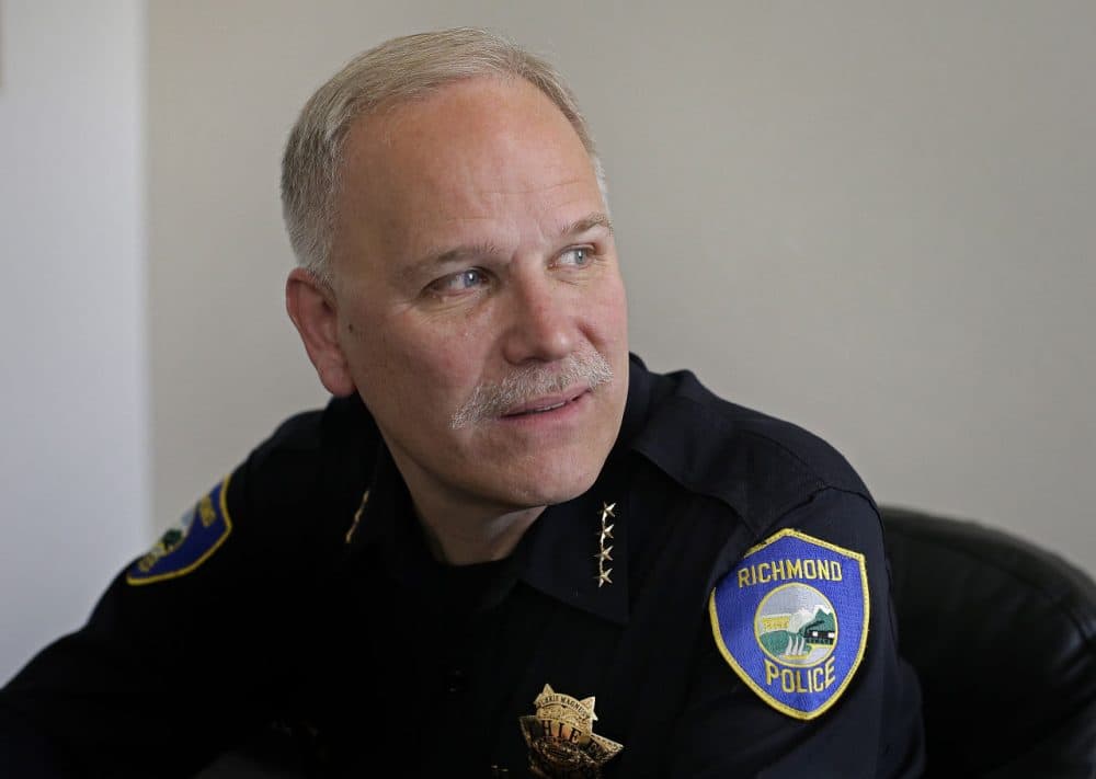 Richmond Police Chief Chris Magnus poses for a photo on Jan. 29, 2015, in Richmond, Calif. The openly gay, white police chief of this tough, minority-dominated Northern California city held up a sign reading “#blacklivesmatter” during a demonstration protesting the deaths of two unarmed black suspects at the hands of Missouri and New York police. The photo of Magnus holding the sign went viral, sparking criticism from the local police officers’ union and debate over whether his participation was appropriate. (Ben Margot/AP)