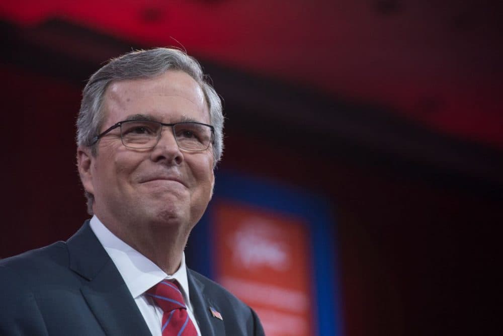 Former Florida Governor Jeb Bush speaks on stage with conservative political commentator Sean Hannity at the annual Conservative Political Action Conference (CPAC) at National Harbor, Maryland, outside Washington, on February 27, 2015. (Nicholas Kamm/AFP/Getty Images)