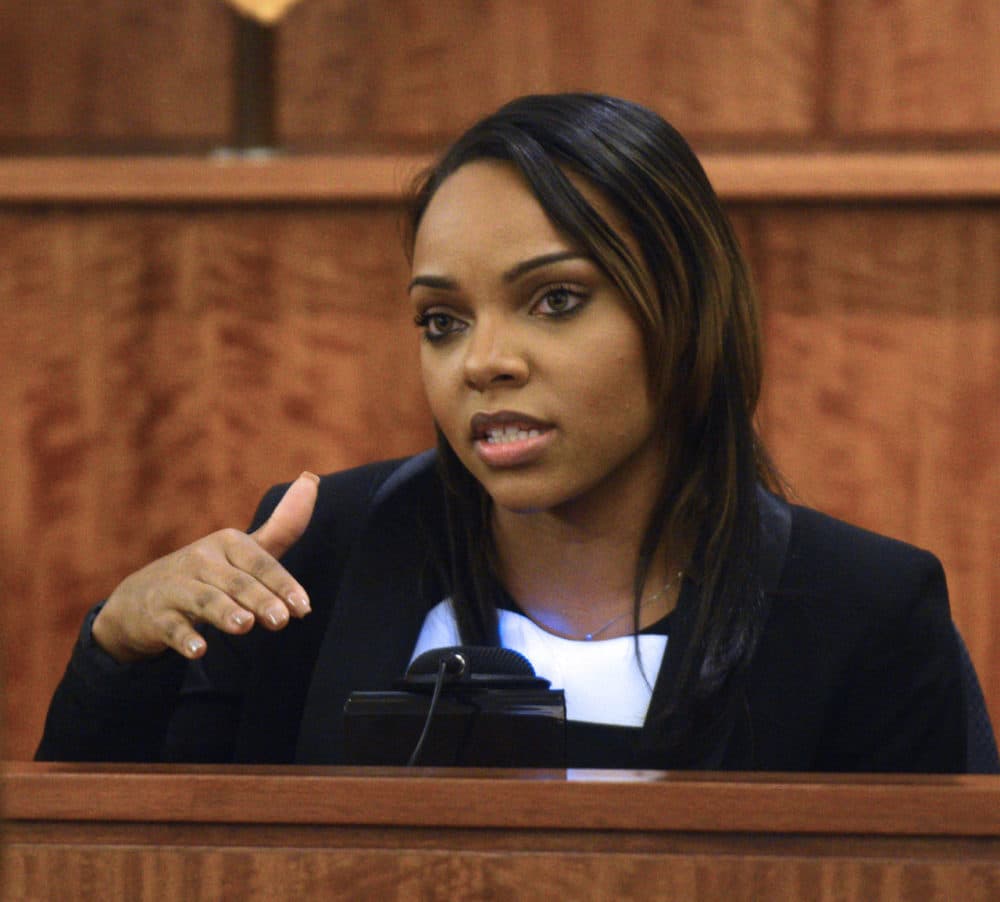 Shayanna Jenkins, fiancee of former NFL football player Aaron Hernandez, testifies in court during Hernandez's murder trial. (Ted Fitzgerald/Boston Herald, Pool via AP)