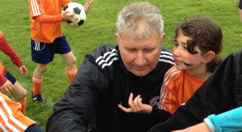 Ralph Ranalli: "There is no other athletic endeavor in which the beauty of the game on the field is as jarringly juxtaposed with the ugliness of the sport as an international business." In this photo, the author is pictured with his daughter Lilly. (Courtesy)