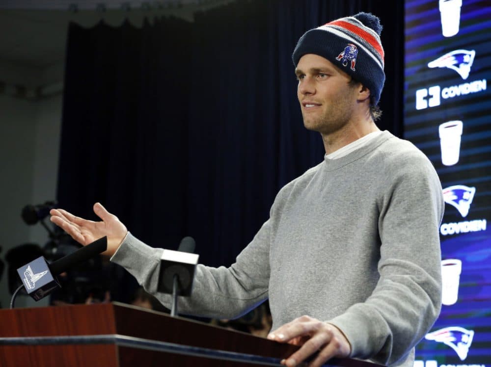 Patriots quarterback Tom Brady answers questions from the press back in January about allegations he used under-inflated footballs during the team's AFC championship win against the Colts. (Elise Amendola/AP)