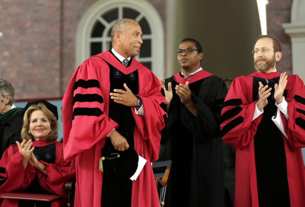 Former Massachusetts Gov. Deval Patrick greets the crowd during Harvard University commencement exercises Thursday. (Steven Senne/AP)