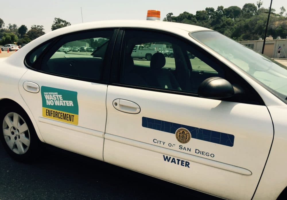 In San Diego, the city sends inspectors out on the streets to look for violations. (Robin Young)
