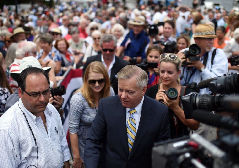 Sen. Lindsey Graham, R-S.C., center, greets supporters after announcing his bid for presidency, Monday, June 1, 2015, in Central, S.C. (Rainier Ehrhardt/AP)