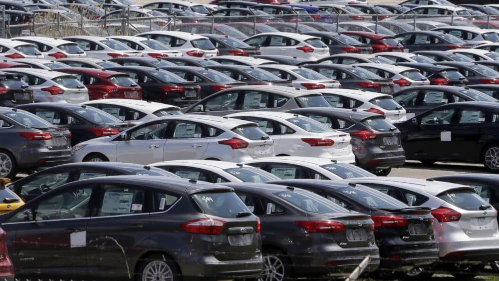 Ford Focus vehicles are seen on a storage lot on Friday, May 1, 2015 in Ypsilanti, Mich. (Carlos Osorio/AP)