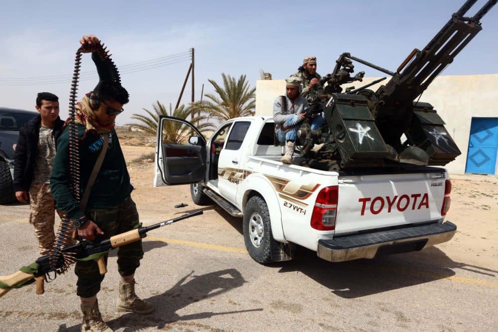 Members of forces loyal to Libya's Islamist-backed parliament General National Congress (GNC) prepare to launch attacks as they continue to fight Islamic State (IS) group jihadists on the outskirts of Libya's western city of Sirte on March 16, 2015. (Mahmud Turkia/AFP/Getty Images)