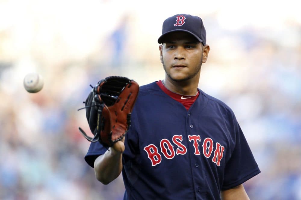Boston Red Sox pitcher Eduardo Rodriguez catches a throw from the third baseman after an out in the first inning of a baseball game against the Kansas City Royals at Kauffman Stadium in Kansas City, Mo., Friday. (AP Photo/Colin E. Braley)
