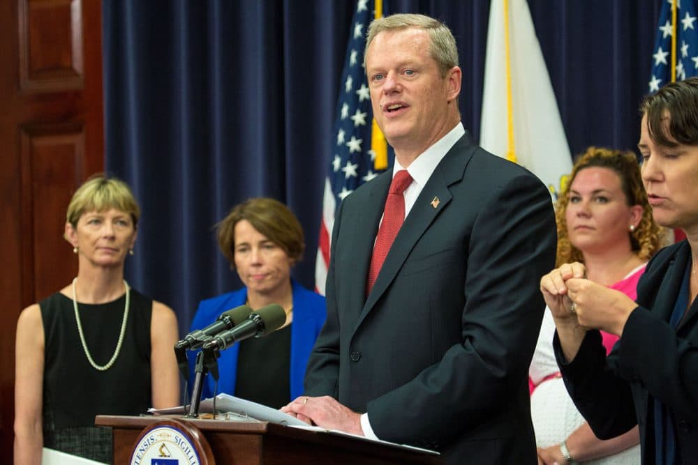 Gov. Charlie Baker announces recommendations of his Opioid Working Group along with Attorney General Maura Healey, second from left, and Health and Human Services Secretary Marylou Sudders, left, at the State House. (Jesse Costa/WBUR)