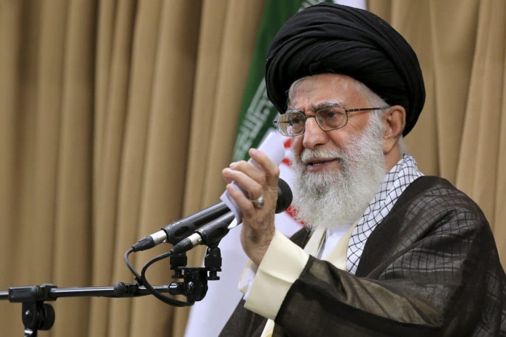 In this picture released by an official website of the office of the Iranian Supreme Leader on Tuesday, June 23, 2015, Supreme Leader Ayatollah Ali Khamenei addresses Iranian top officials in a mosque at his residence in Tehran, Iran. Iran's top leader has hardened his stance in nuclear negotiations with world powers as a deadline for a final deal rapidly approach, saying he rejects a long-term freeze on nuclear research and wants to ban international inspectors from accessing military sites. The comments by Khamenei, who repeatedly has backed the Islamic Republic's negotiators amid criticism from hard-liners, may give his diplomats little room for concessions ahead of the June 30 deadline. (Office of the Iranian Supreme Leader via AP)