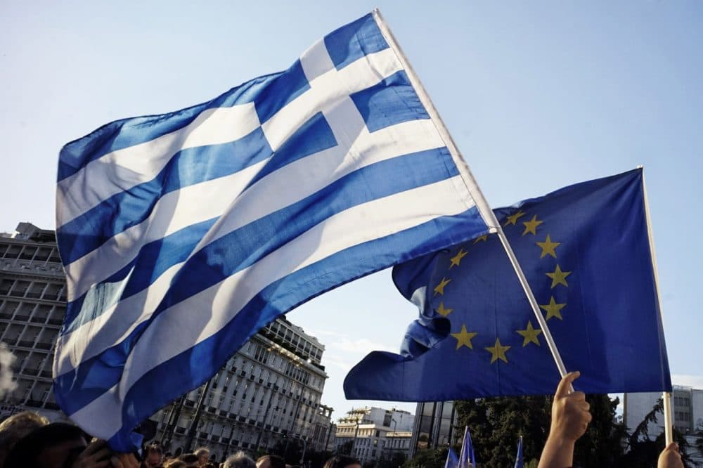 Pro-Euro protesters take part in a rally in front of the Parliament on June 22. 2015 in Athens, Greece. Thousands of people attended the rally in support of Greece remaining in the European Union. Greek banks are closed for six days amid the uncertainty about the bailout deal. (Milos Bicanski/Getty Images)