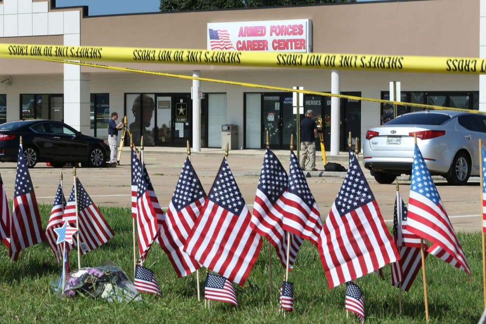 Members of the FBI Evidence Response Team investigate the shooting at the Armed Forces Career Center/National Guard Recruitment Office on July 17, 2015 in Chattanooga, Tennessee. (Joe Raedle/Getty Images)