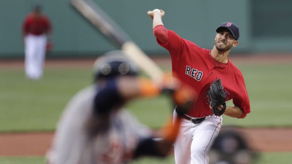 Boston Red Sox starting pitcher Rick Porcello delivers to the Detroit Tigers during the first inning of a game at Fenway on Friday, July 24, 2015. (Charles Krupa/AP)