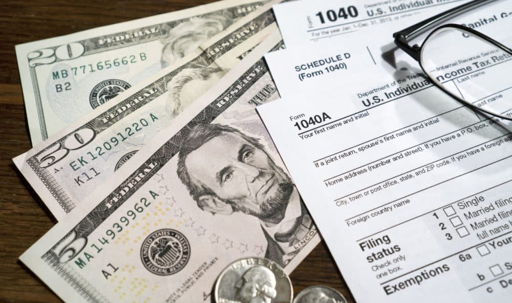 Massachusetts currently has a flat income tax of 5.15 percent. (Pictures of Money/Flickr)