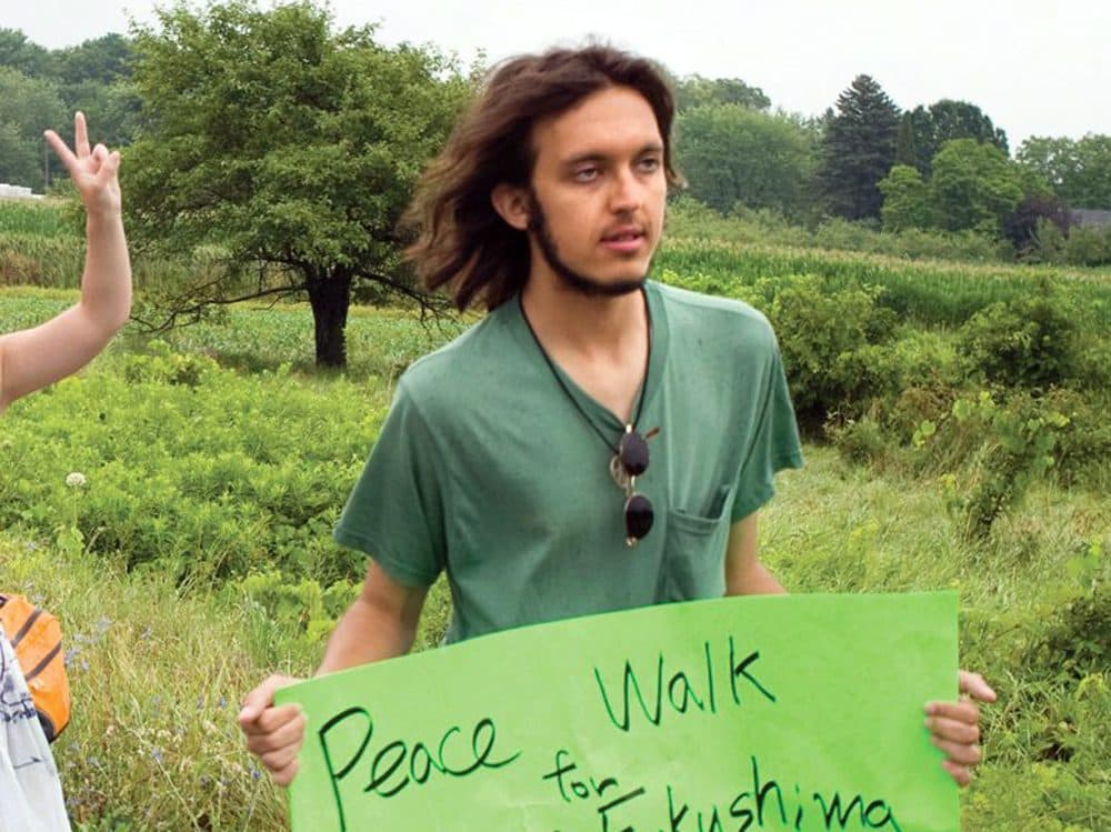Alexander Ciccolo in 2012, participating in a peace walk through Ontario. (Dave Fraser/Northumberland News via AP)