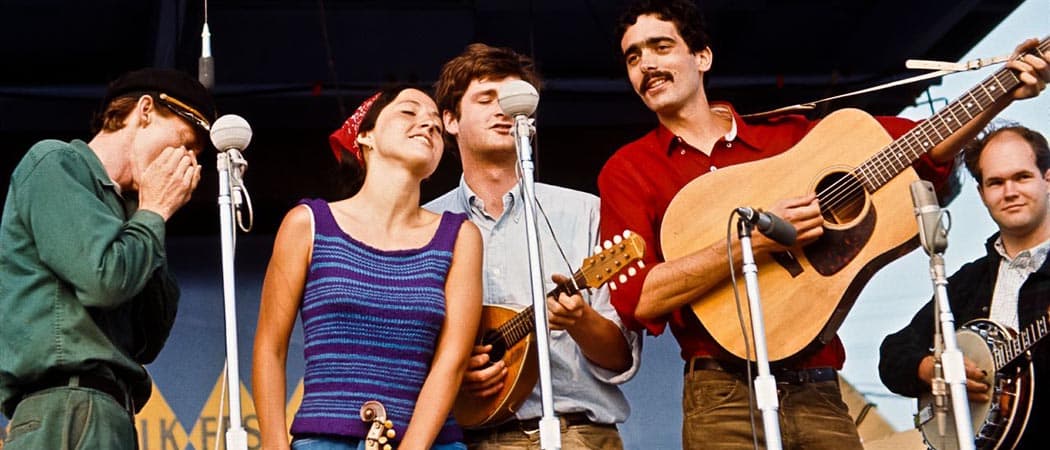 The Jim Kweskin Jug Band performs at the 1964 Newport Folk Festival. From left: Mel Lyman, Maria Muldaur, Geoff Muldaur, Jim Kweskin and Bill Keith. (Photo courtesy Jim Kweskin/Joe Alper)