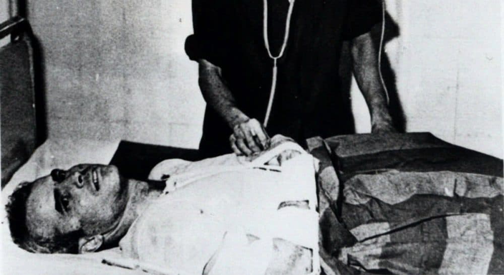 Laura McTaggart: "In the case of John McCain, the word in all its weighty glory hardly seems enough." Pictured: John McCain is administered to at a Hanoi, Vietnam, hospital as a prisoner of war in 1967. Republican presidential candidate Donald Trump criticized Sen. John McCain's military record at a conservative forum Saturday, July 18, 2015, saying the party's 2008 nominee and former prisoner of war was a "war hero because he was captured. I like people who weren't captured." McCain spent 20 years in the Navy, a quarter of it in a Vietnamese prisoner of war camp after his jet was shot down over Hanoi during a bombing mission Oct. 26, 1967. (AP Photo)