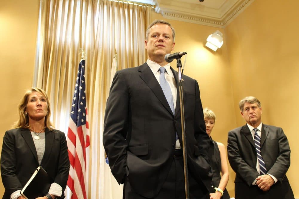 Gov. Charlie Baker speaks during a press conference Monday on the death of a 2-year-old foster child. He's joined by, from left to right, Lt. Gov. Karyn Polito, Health and Human Services Secretary Marylou Sudders, and Secretary of Public Safety and Security Daniel Bennett. (State House News Service)