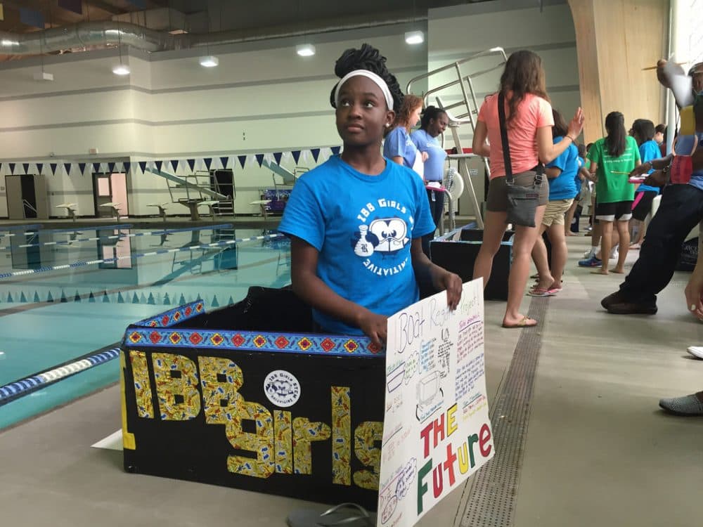 Dozens of teenage girls from Chavez High School built cardboard boats for a regatta. (Houston Public Media)