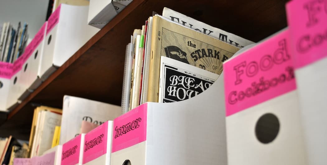 Zines on the shelf at the Papercut Zine Library (Matt Mullen for WBUR)