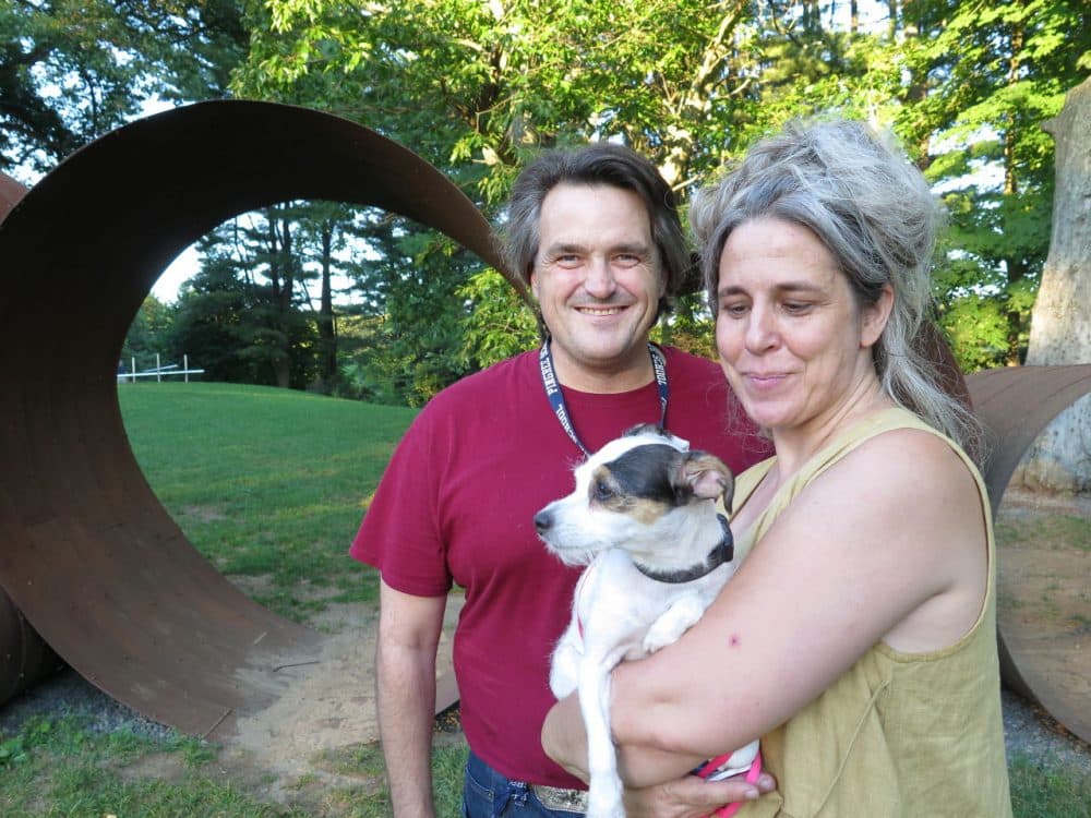 Jason Reis with his wife Karen Krolak went on a special group walk of the deCordova Sculpture Park and Museum with their cultured Jack Russell Terrier mix, "Quacks." (WBUR/Andrea Shea)