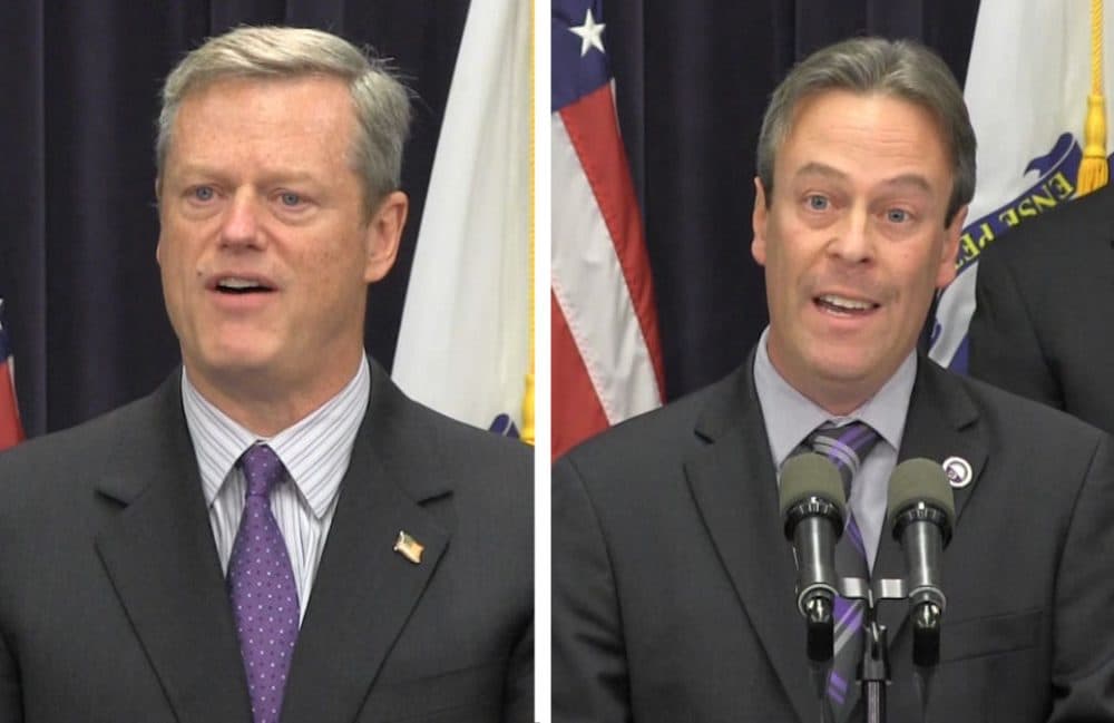 Gov. Charlie Baker, left, and Peter MacKinnon, DCF Chapter President of SEIU Local 509, speak about Baker's reforms on Monday. (Antonio Caban/State House News Service)