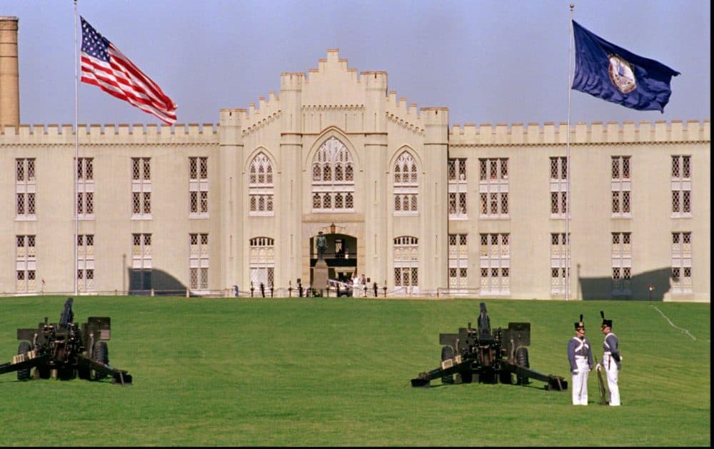 Virginia Military Institute cadets man cannons used to deliver a 21-gun salute in front of the barracks at VMI (Steve Helber/AP Photo)