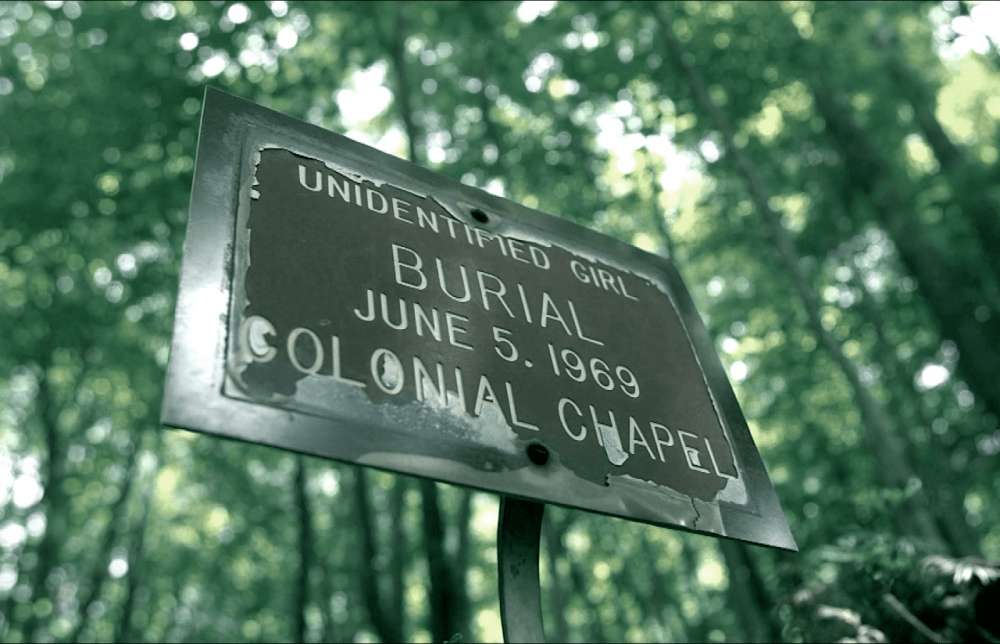 Around Thanksgiving last year, authorities gathered near the grave of Mountain Jane Doe, hoping to exhume her and end the mystery of who she was. (Scott Anger for Reveal)