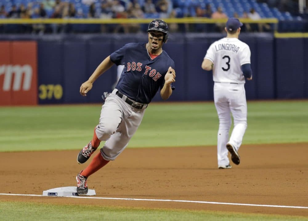 Boston Red Sox's Xander Bogaerts races home on an RBI double by David Ortiz during the first inning. (Chris O'Meara/AP)