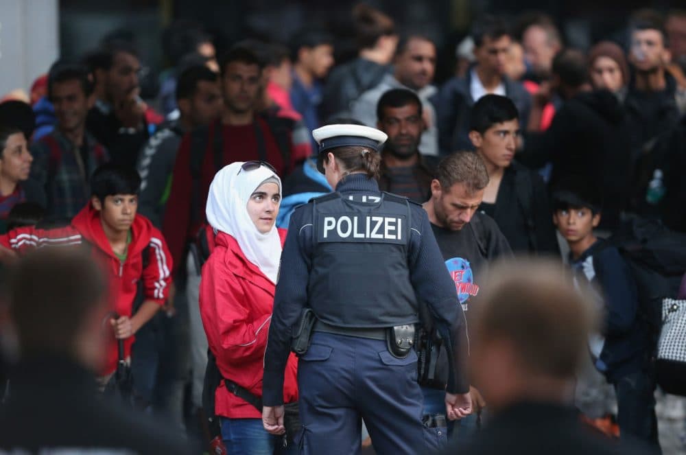 Migrants arrive from Hungary at the Munich Hauptbahnhof main railway station on September 5, 2015 in Munich, Germany. (Sean Gallup/Getty)