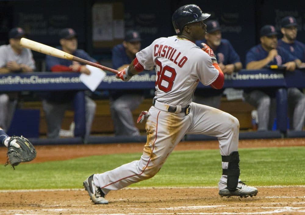 Red Sox's Rusney Castillo hits the game-winning RBI against the Rays during the 13th inning of a game Sunday, Sept. 13, 2015, in St. Petersburg, Fla. The Red Sox won 2-0. (Luke Johnson/AP)