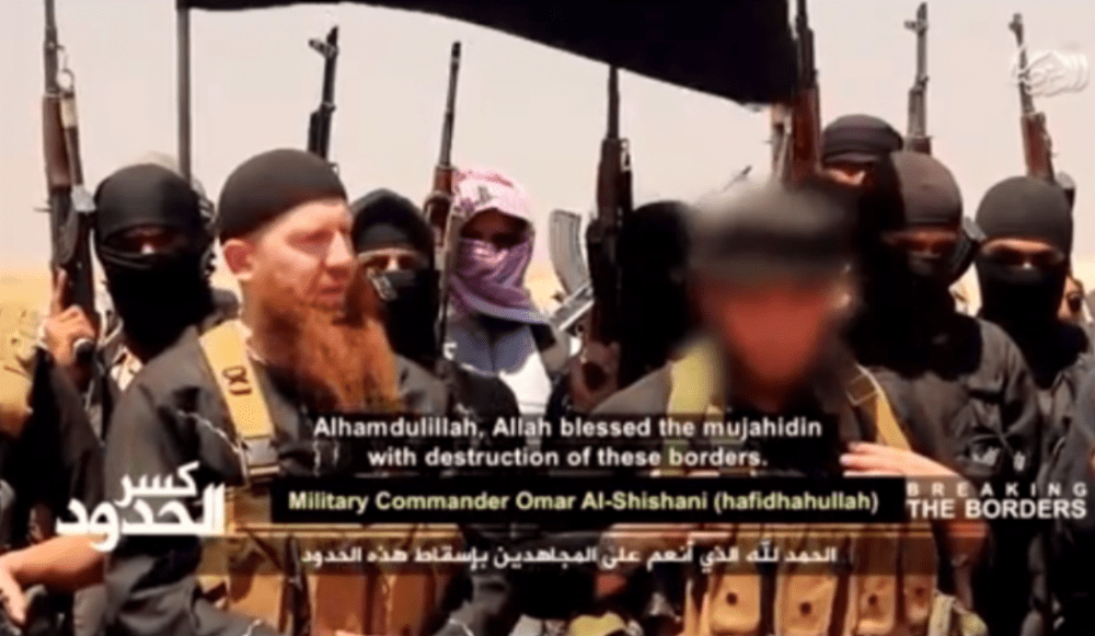 Abu Omar al-Shishani (left) is pictured in this screenshot from an ISIS video posted on the internet.