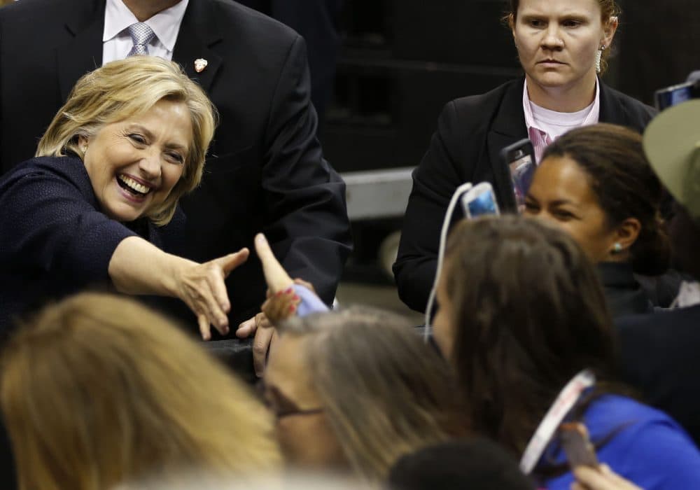Democratic candidate Hillary Rodham Clinton reaches to shake hands after speaking at New Hampshire's annual Democratic convention Saturday, Sept. 19, 2015. (Jim Cole/AP)