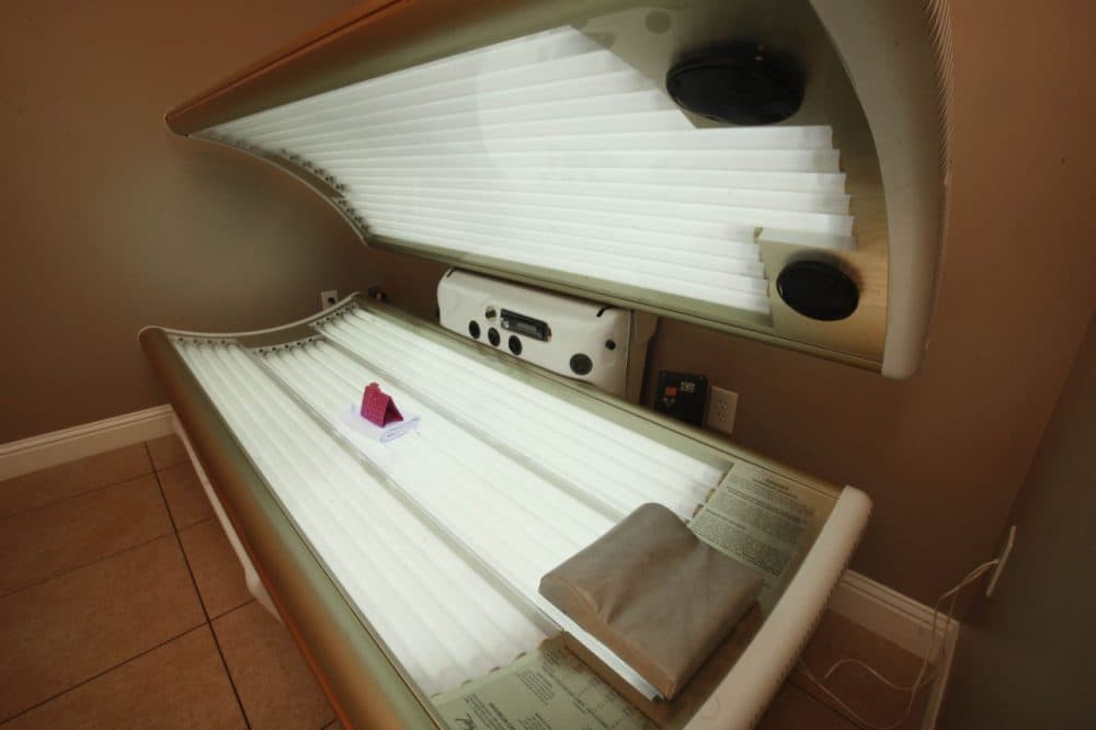 This 2011 photo shows a tanning booth at Amazing Tans in Sacramento. A bill that would make it illegal for people younger than 18 to use tanning beds has passed the Massachusetts Senate. (Rich Pedroncelli/AP)
