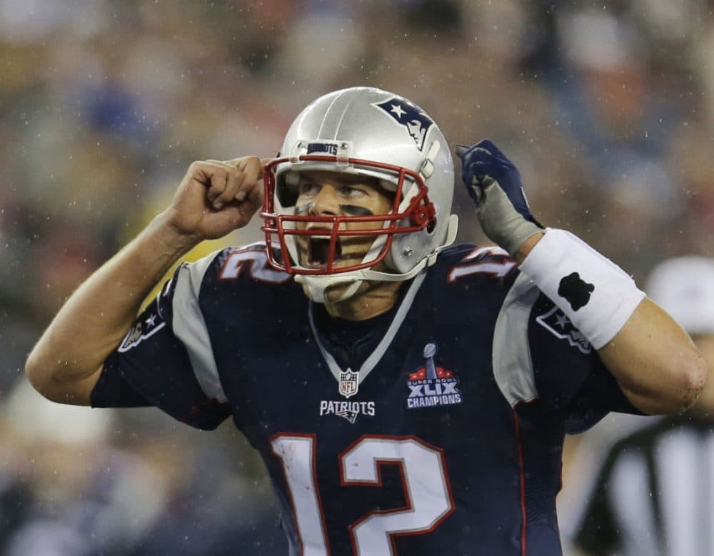 Patriots quarterback Tom Brady calls signals at the line of scrimmage in the first half of the season opener against the Pittsburgh Steelers. (Charles Krupa/AP)