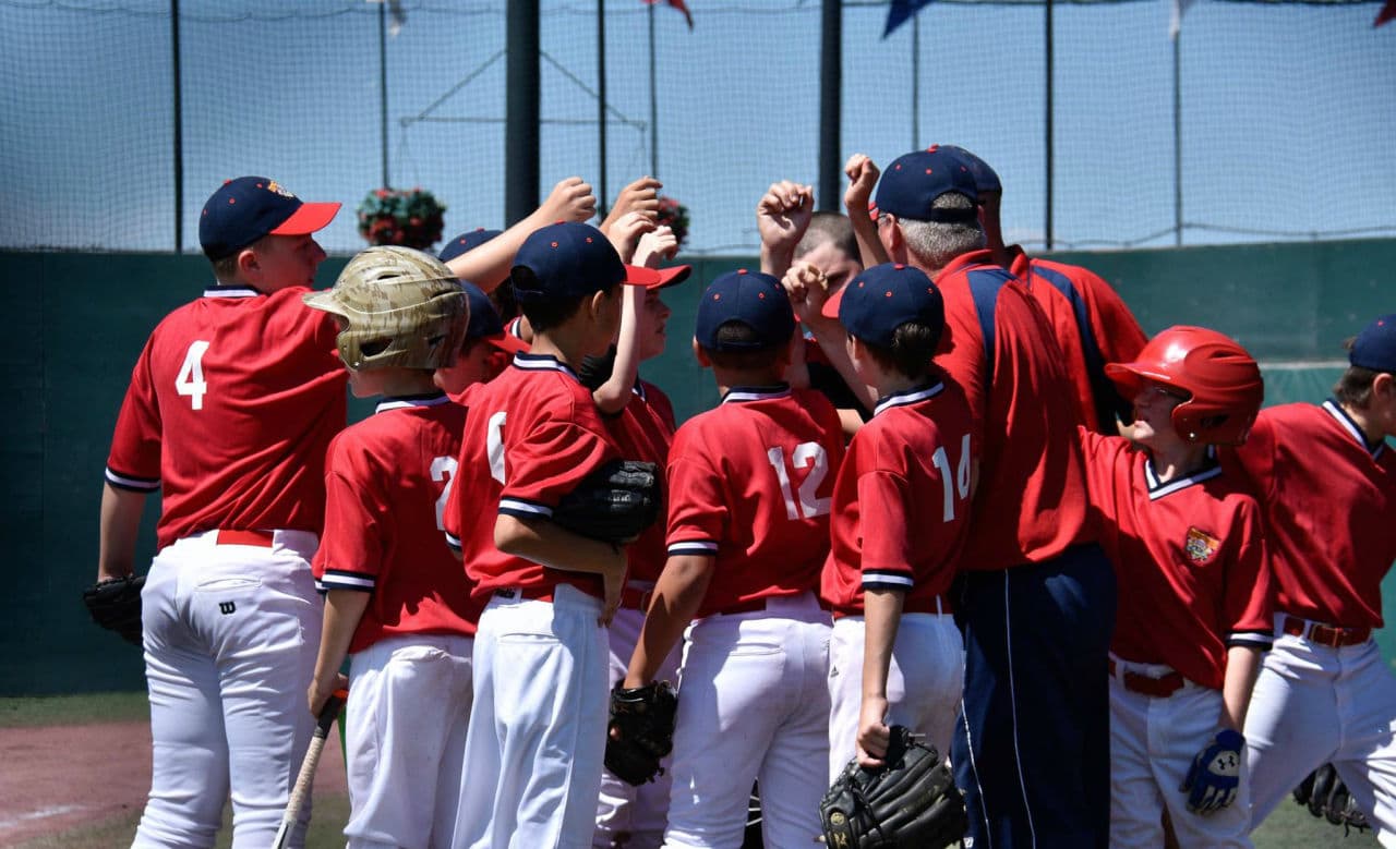 The author's team, the Lions, prepare for their first at-bat in their game against the California Rox. (Alex Belisle/Courtesy)