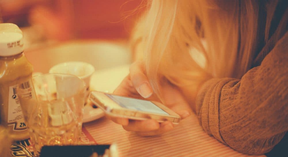 A mother ponders why her children are happy to text her, but refuse to talk on the phone. (SplitShire)