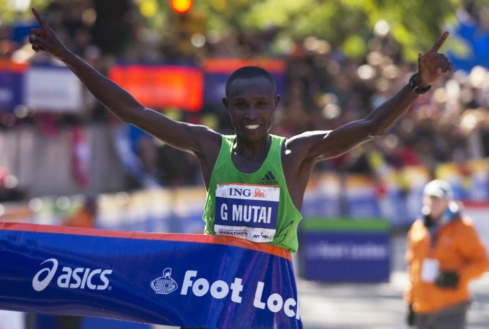 Geoffrey Mutai of Kenya crosses the finish line to win the ING New York City Marathon November 6, 2011 in New York. Mutai, the 2011 Boston Marathon winner, won the men's New York Marathon in an unofficial time of two hours, five minutes and five seconds to smash the course record on Sunday. (Don Emmert/AFP/Getty Images)