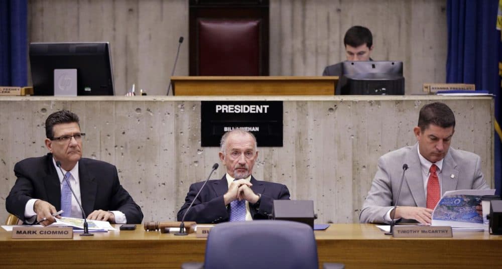 Boston City Council President Bill Linehan, center, listens during a council meeting in June. (Stephan Savoia/AP)