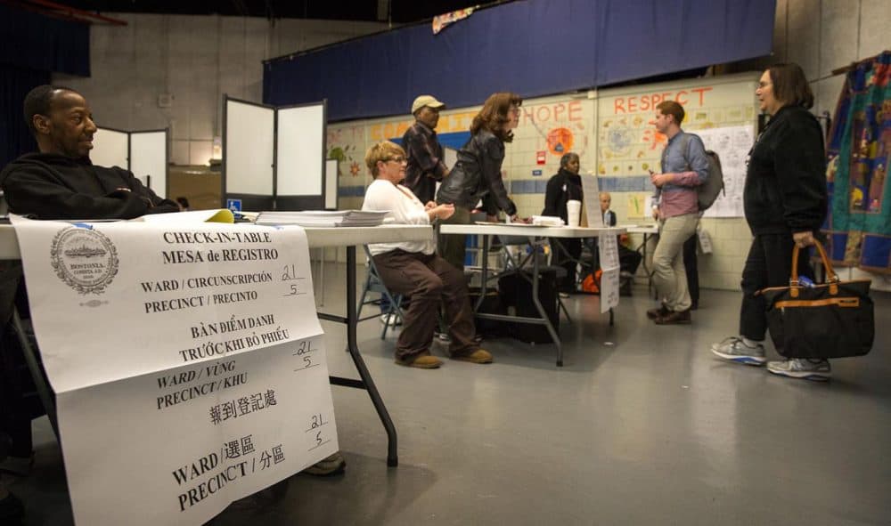 Voters line up at the Jackson/Mann School in Boston's Allston on Tuesday. (Robin Lubbock/WBUR)