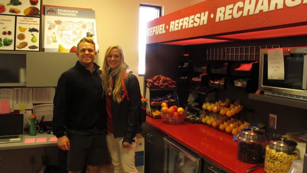 Ohio State softball player Maddy McIntyre (right) with sports nutrition intern Sebastian Zorn at one of the new fuel zones on campus. (Martin Kessler/Only A Game)