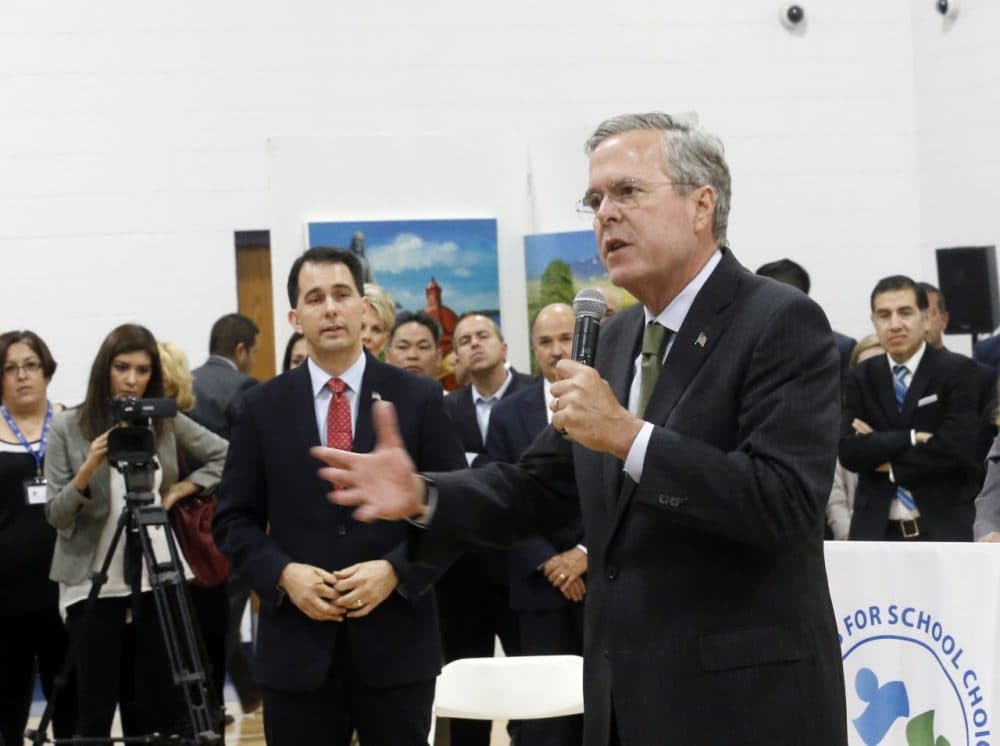 Republican presidential candidate, former Florida Gov. Jeb Bush and Wisconsin Gov. Scott Walker Monday at a campaign event in Waukesha, Wis. (Morry Gash/AP)
