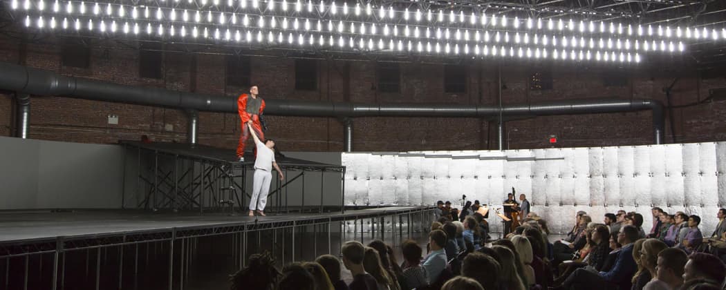 The Cyclorama's industrial-looking setting creates a powerful backdrop to the Boston Lyric Opera's production of "In the Penal Colony," which is seen here in a dress rehearsal held Monday evening. (Courtesy of T Charles Erickson/The Boston Lyric Opera)