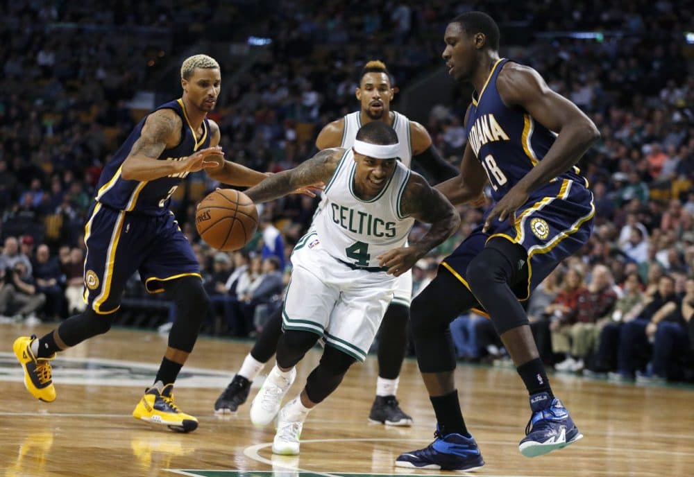 Boston Celtics' Isaiah Thomas (4) drives past Indiana Pacers' Ian Mahinmi (28) during the game in Boston, yesterday. The Pacers won 102-91. (Michael Dwyer/AP)
