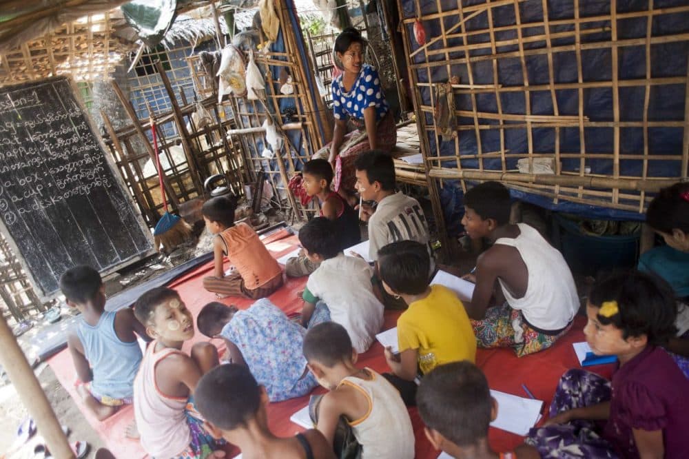 Ethnic Rohingya Muslim children attend an English class near a refugee camp outside the city of Sittwe in Myanmar's Rakhine state on May 22, 2015. (Ye Aung Thu/AFP/Getty Images)