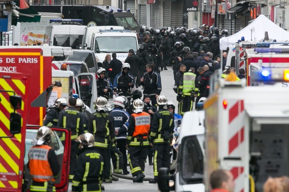 French special forces and medical vehicles are seen on Rue de la Republique on November 18, 2015 in Saint-Denis, France. French police special forces raided an apartment, hunting those behind the attacks that claimed 129 lives in the French capital five days ago. At least one person was killed in an apartment targeted during the operation aimed at the suspected mastermind of the attacks, Belgian Abdelhamid Abaaoud. At least five police officers have been wounded in the shootout. (Marc Piasecki/Getty Images)
