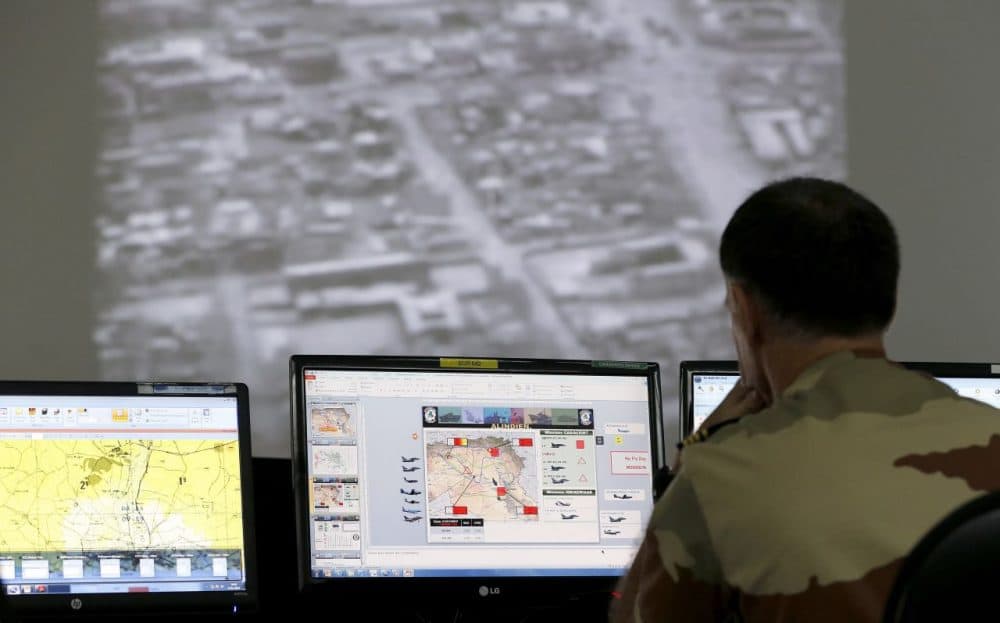 A French soldier sits in a control room at a French military base at an undisclosed location in the Gulf on November 17, 2015, as he monitors operations against the Islamic State group in Syria and Iraq.(Karim Sahib/AFP/Getty Images)