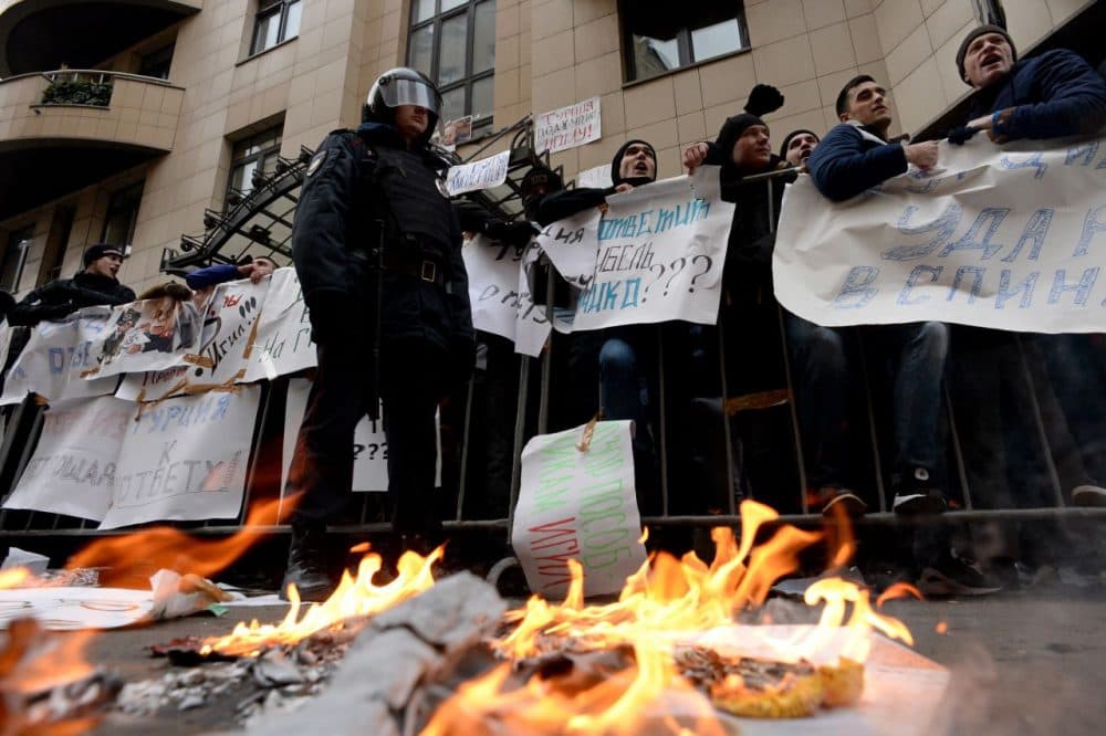 Protesters hold placards and shout slogans as they take part in an anti-Turkey picket outside the Turkish embassy in Moscow on November 25, 2015. Turkey shot down a Russian war plane on the Syrian border on November 24, sending tensions spiraling as Russian President Vladimir Putin warned Ankara its "stab in the back" would have serious consequences. (Kirill Kudryavtsev/AFP/Getty Images)