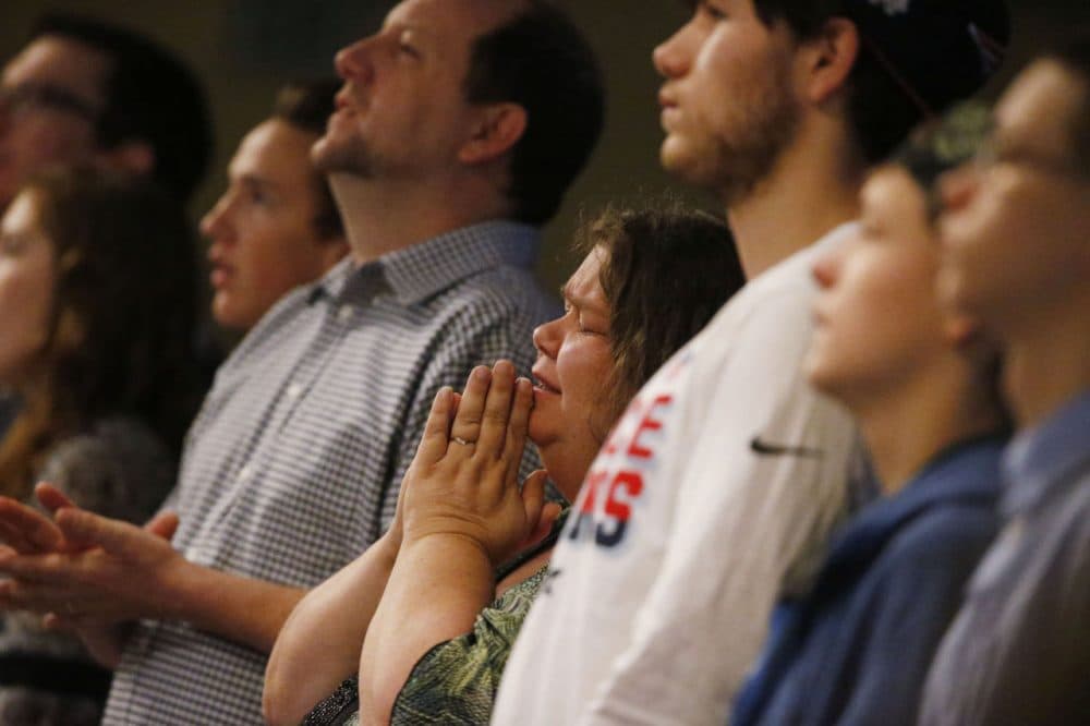 Members of Hope Chapel take part in service early Sunday, Nov. 29, 2015, in northeast Colorado Springs, Colo. University of Colorado-Colorado Springs police officer Garrett Swasey, who was one of the three victims of a shooting at a nearby Planned Parenthood clinic Friday, was a member of the congregation. (David Zalubowski/AP)